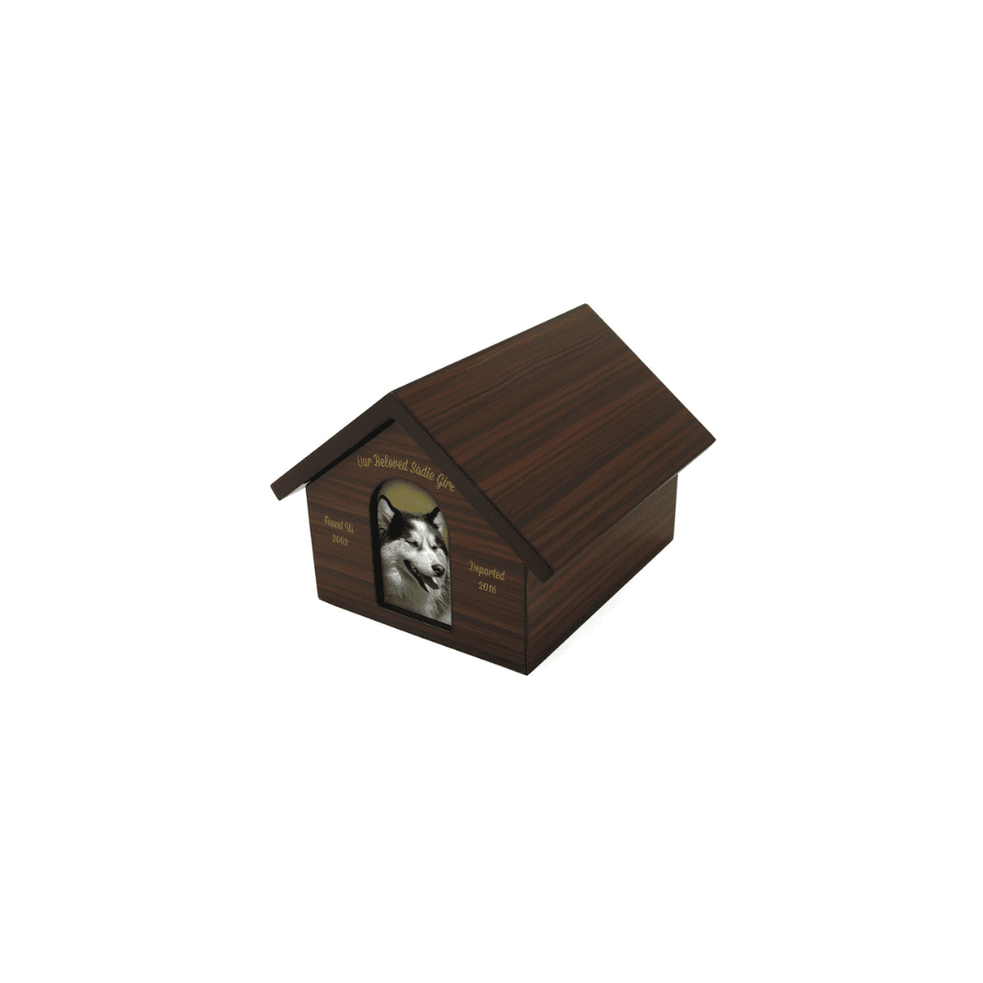 A wooden dog house with a picture of a dog inside.